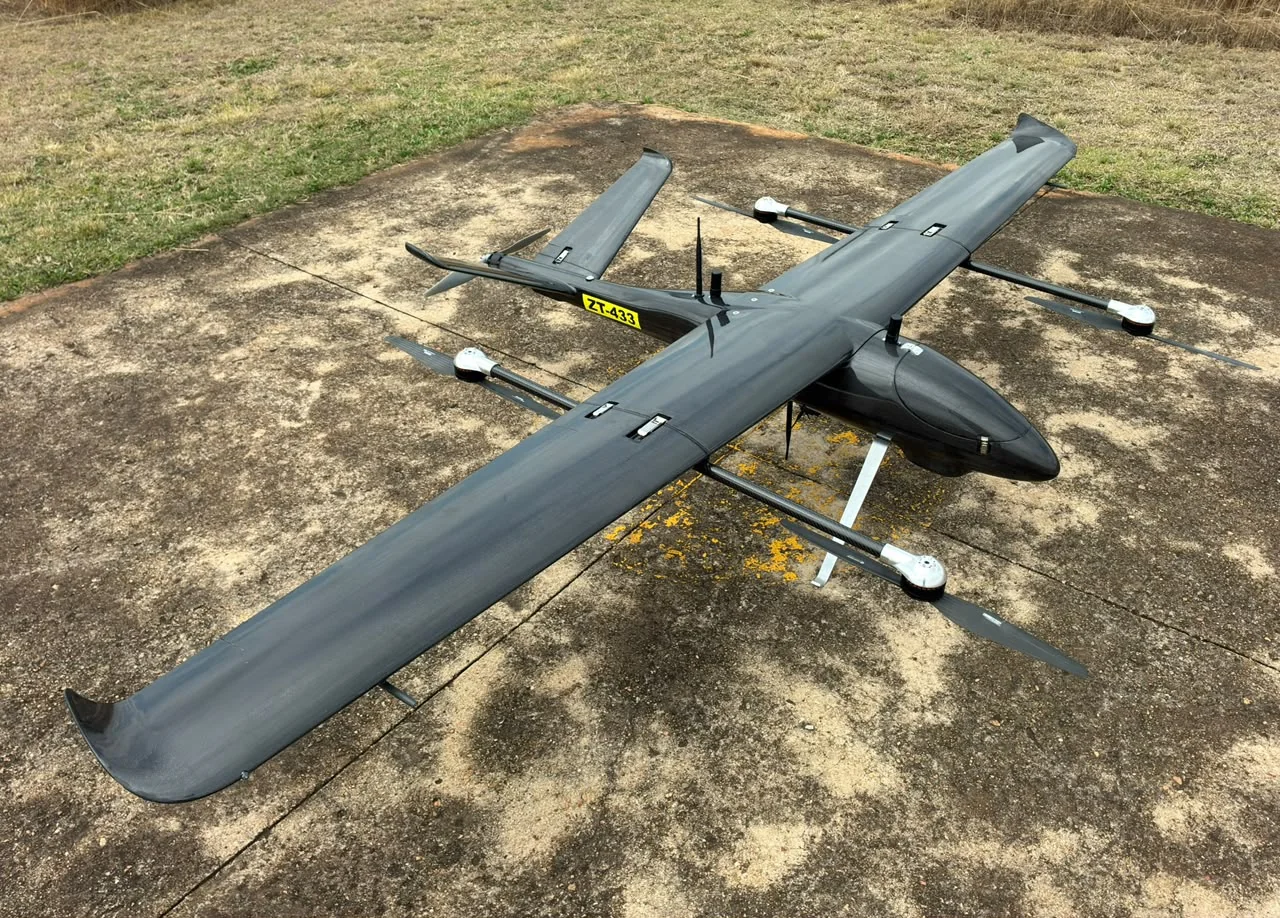 Overhead photograph of the Sky Robots VTOL wing and electric propulsion layout