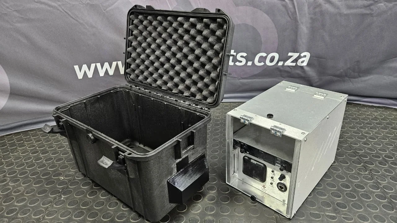 Radio over IP equipment next to its open transport case