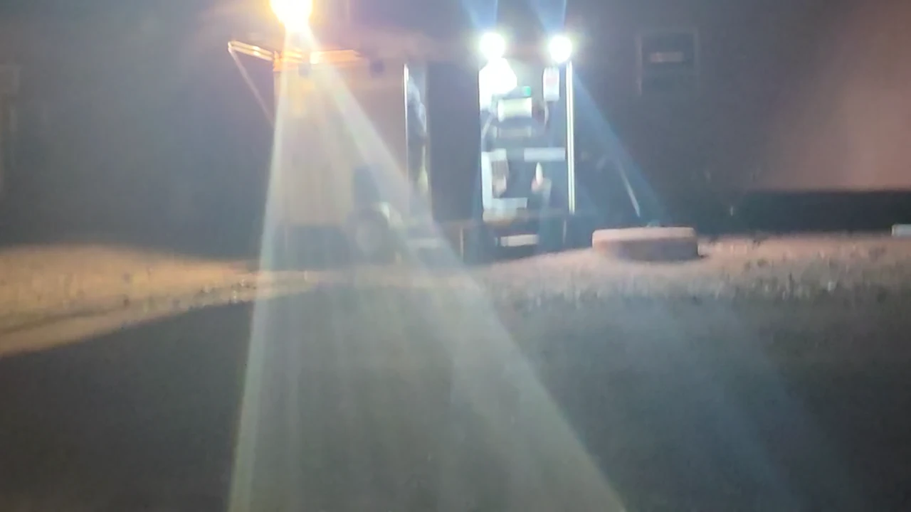 Sky Robots Command and Control trailer with its doorway open at night